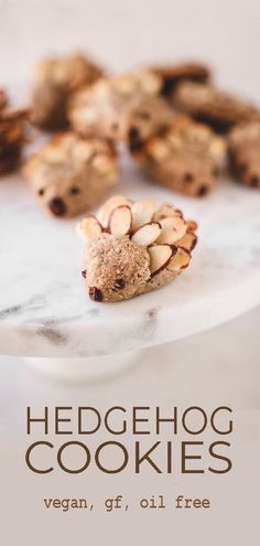 cookies are arranged on a plate with the words hedgehog cookies vegan, gf, oil free