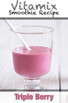 a smoothie in a glass with a straw sticking out of it and the text, triple berry smoothie mix