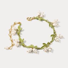 An impeccably crafted piece, the Lily of the Valley Bracelet is a timeless accessory to add to your collection. Delicately woven with pearls, this elegant bracelet is perfect to finish off any outfit and will elevate your look to a superior level of sophistication. DETAILS Materials:   18K Gold on Brass, Agate Measurements: Length: 6.69"(17cm) + Extender: 2.76"(7.0cm) Weight:  15.43g There will be a little difference among different production batches of products due to the variation of natural Jess Core, Cottagecore Bracelet, Cottagecore Accessories, Lily Of The Valley Flowers, Cuban Link Chain Necklaces, I'm Broke, Opal Pendant Necklace, Enamel Necklaces, Freshwater Pearl Bracelet