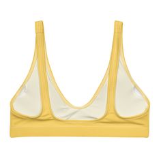 The bright yellow bralette bikini top is your go-to for everything under the sun and in saltwater. This women's swimsuit top is made with recycled fabric and crafted with light support. Features a deep v-neck. • 81% REPREVE recycled polyester, 19% LYCRA XTRALIFE • Fabric weight 7.52 oz • Double-layered and non-reversible • Removable padding • Tear-away care label • Zig-zag stitching Size guide CHEST WAIST HIPS XS (inches) 33 ⅛ 25 ¼ 35 ⅜ S (inches) 34 ⅝ 26 ¾ 37 M (inches) 36 ¼ 28 ⅜ 38 ⅝ L (inches Summer Yellow Bra With Comfort Fit, Gold Bralette, Tank Bikinis, Women's Swimsuit, Recycled Polyester Fabric, Sunshine Yellow, Swim Suit Bottoms, Intense Workout, Care Label