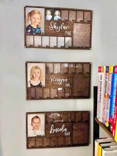 three framed pictures on the wall above a bookshelf with children's portraits