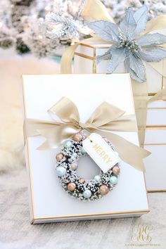 a gift box with a christmas wreath on it