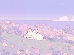 an animal laying in the grass with flowers