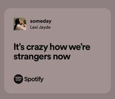 an ad for spotify with the caption it's crazy how we're strangers