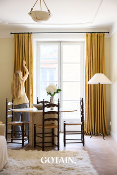 A cosy living room featuring luxurious mustard linen curtains, offering a warm, stylish accent to the space. Flowing Curtains, Soft Natural, The Space, Natural Light, Dining Room, Curtains