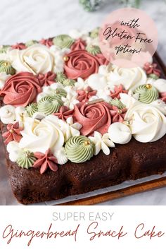 a chocolate cake with white and pink flowers on it