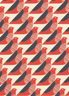 a red and black bird is in the middle of an abstract pattern with diagonal stripes