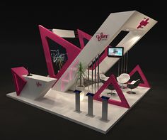 an exhibit stand with pink and white furniture