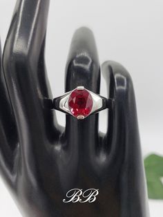 Made to order. Please allow up to 3 weeks for the production of your ring. This listing is for a 925 non-plated sterling silver ring with a lab created red ruby oval gemstone in the size of your choosing. Photos show the 10x8mm size ruby. Available Lab Red Ruby Stone Sizes 8x6mm (1.25 Carat Approximately) 9x7mm (2 Carat Approximately) 10x8mm (2.5 Carat Approximately)  Gemstone Type: Lab Created Ruby Shape: Oval Cut Size: Your Choice Color: Red Quality: AAA Hardness: 9 Mohs Did you know lab-created rubies are equivalent to natural rubies? Lab grown rubies have the same chemical composition as natural rubies. They have the same refractive index (sparkle), specific gravity etc. They are made of corundum, the same thing mother nature makes natural rubies from but at a fraction of the cost! Wat Oval Cut Ring, Ruby Stone, Red Ruby, Denver Co, Natural Ruby, 2 Carat, Oval Cut, Mother Nature, 3 Weeks