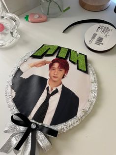 a cake that has been decorated to look like the face of bts member kpop