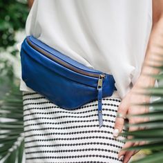 Blue leather fanny pack for woman Belt bag Belly bag gold zipper Small waist bag Hip bag women Leather belt pouch Navy blue leather bum bag While most leather belt pouch have singular styles of use, this blue fanny pack has multiple styles of use. The fringe are fixed on buttons and can be removed. Thanks to that, you can experiment and wear hip pouch in conjunction with other accessories or clothes ... Hip bag like this are a true space saver.  Leather fanny pack in a fashionable design, this l Leather Bum Bag, Woman Belt, Waist Bag Leather, Leather Belt Pouch, Belly Bag, Hip Pouch, Cross Shoulder Bags, Leather Hip Bag, Leather Fanny Pack