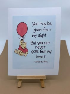 a card with winnie the pooh holding a balloon saying you may be gone from my sight but you are never gone from my heart