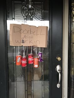 a door with a sign on it that says, don't be afraid to drink