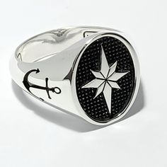 💍 Amazing North Star signet ring.       Unisex oval chevalier ring. 📜 A North Star sign engraving on top anchor engraving on bands, with hand polishing and black         oxidized or black/blue enamel work.        Available in gold K9, K14, or K18 with an amazing optical look.  ⚖ Ring weight 12gr approximately. 📐 Total dimensions 14x18 on top .  ✍ Designed and created by Babuco Jewellery Athens.  ♻   Recycled item! 💍 A special gift for your loving person or yourself! 🎁 Gift box included! 😊 Thank you for stopping by! 🛠   Free services to renew your beloved jewels purchased from my shop.          You will be charged only for the shipping costs. John Hardy Rings, North Star Ring, Enamel Rings, Anchor Rings, Silver Jewelry Cleaner, Recycled Items, Local Jewelry, Enamel Ring, Ring Oval