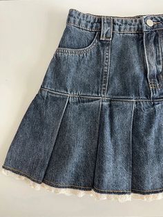 Get ready to turn heads with our Lace Trim Pleated Denim Mini Skort! This classic skort is the perfect addition to any girly wardrobe. With its flirty pleated denim skirt and delicate lace trim, it's sure to add a fun and playful touch to any outfit. Elevate your style game with this must-have piece. Size Chart: Size Waist (cm) Hips (cm) Length (cm) Waist (in) Hips (in) Length (in) S 64 92 37 25.20 36.22 14.57 M 68 96 38 26.77 37.80 14.96 L 72 100 39 28.35 39.37 15.35 XL 76 104 40 29.92 40.94 15 Casual Cotton Mini Skirt With Lace Trim, Corduroy Skirt Outfit, Skirts Y2k, Retro Kawaii, Pleated Denim Skirt, Mini Skirt Fashion, Korean Skirt, Streetwear Spring, High Waist Mini Skirt