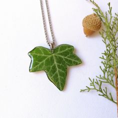 This real ivy necklace is a unique creation from my forest jewelry collection. A beautiful green leaf necklace as the perfect gift for Mother's day. This green leaf necklace is truly original and unique: I have dried the ivy leaf and then covered it with crystalline resin to provide a perfect shine. Take this forest leaf necklace always with you to feel really unique! You will never go unnoticed wearing this real ivy necklace: Its elegance, beauty and class will make you shine on any occasion, w Ivy Necklace, Rustic Wedding Jewelry, Organic Necklace, Fantasy Pendant, Forest Jewelry, Forest Gift, Forest Necklace, Cottagecore Gifts, Woodland Jewelry