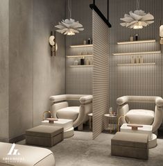 the interior of a hair salon with chairs, stools and lamps hanging from the ceiling