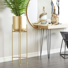 a mirror and some plants on a table