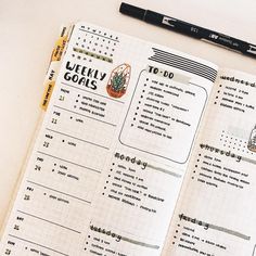 an open planner with weekly goals on it