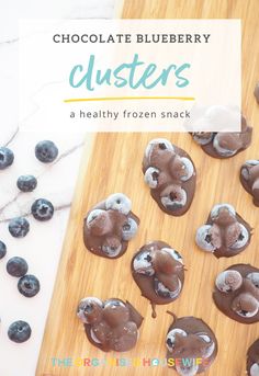 chocolate blueberry clusters on a cutting board with text overlay that reads, chocolate blueberry clusters a healthy frozen snack