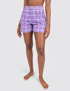 This high-waisted shorts style is cute and flattering. Features two side pockets, two back pockets, an elastic back waistband for a comfort fit, and a front zipper with candy red button closure. Constructed with 100% cotton fabric, custom made in France. Mix & match your look with more Grid Collection styles 100% cottonPreshrunk, true to sizeUnisex sizes Mini- 4XL Naomi is 5' 7" and wears size S Made in Los Angeles, California Daywear Bottoms With Built-in Shorts, Cotton Bermuda Shorts With Built-in Shorts, Trendy Cotton Skort With Built-in Shorts, Trendy Cotton Knee-length Shorts, Trendy Short Length Pants With Elastic Waistband, Cotton Athletic Shorts With Built-in Shorts, Trendy High-waisted Cotton Bermuda Shorts, Short Loungewear Bottoms With Side Pockets, Fitted Cotton Athletic Shorts