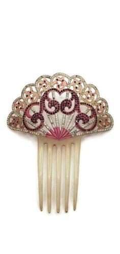 Large antique hair comb in a unique color this is opqque with different shades of pink and purple rhinestones and clear silver rhinestones. The color scheme and scroll work are gorgeous. Excellent Condition. None of the rhinestones are missing, and the comb is perfect condition meaning no broken comb pieces. Measures 5 1/2 inches at the tops Widest The total length from top to bottom is 6 1/2 inches To view our Hair Accessories Section click the link below https://www.etsy.com/shop/WhyWeLoveTheP Antique Hair Comb, Hair Pins For Wedding, Jewel Hair, Edwardian Hairstyles, Antique Hair Combs, Vintage Hat Boxes, Art Deco Hair, Rhinestone Hair Comb, Hair Comb Bridal