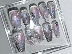 "✨ Adorn your nails with the allure of the cosmos. Our holographic purple press-on nails are a symphony of elegance and sophistication. Each nail boasts a captivating hue that dances with celestial charm, reflecting a luxurious purple shimmer akin to distant galaxies.💅 🎀 Embellished with meticulously crafted silver gel lines forming radiant bows, these nails exude opulence. The sparkling silver accents cascade across the holographic backdrop, adding a touch of glamour and allure to your finger Nail Art Y2k, Nails Silver Glitter, Purple Press On Nails, Art Y2k, Purple Nail Art, Fake Nails Designs, Nails Silver, Purple Nail, Y2k Nails