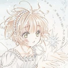 an anime character with pearls on her hair