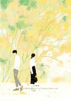 two people walking in front of a tree with yellow and green leaves on the branches