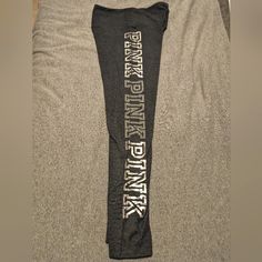 These Are Leggings From The Coveted "Good Bling" Era Of Vs Pink! (If You Know, You Know!) These Charcoal Gray Leggings Stay In Place, The Rhinestone & Metallic Details Jazz Up Any Athleisure Fit, And They Are Super Comfortable! No Missing Gemstones On The Logo Printed Down The Leg Or Cracking - Size Medium! Only Worn A Handful Of Times On The Salesfloor! I Used To Work At Vs Pink, And I Have A Lot Of Gently Worn, Like-New Products I Will Be Posting That Have Been In Storage. I Do Believe I Have Silver Stretch Bottoms For Sports, Silver Stretch Sports Bottoms, Fitted Silver Sports Bottoms, Sporty Silver Fitted Bottoms, Posting Soon, Gray Leggings, Pink Jumpsuit, Grey Leggings, Pink Leggings