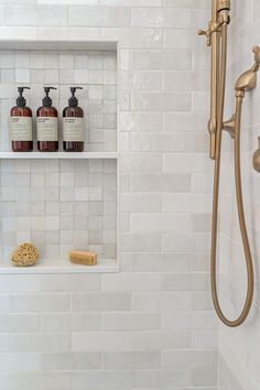 Zellige shower, Delta Cassidy, Brass sconce, Porcelain tile, Bedrosians Cloe, Shaker cabinet Shower Glass Half Wall, Trim Around Shower Surround, Timeless Shower Tile, Stacked Tile Shower Wall, Tile Shower Shelves, Bathtub Niche, Soap Niche, Shower Nook, Shower Niche Ideas