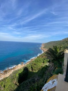 the view from an overlook point looking out at the ocean