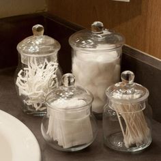 Small Glass Apothecary Jars with Lids, Set of 4 - MyGift Apothecary Bathroom, Apothecary Jars Bathroom, Apothecary Jars Decor, Bathroom Jars, Bathroom Counter Decor, Small Glass Jars, Jars With Lids, Glass Apothecary Jars, Restroom Decor