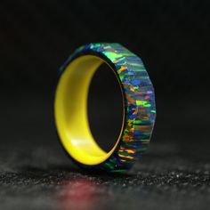 Black Fire Opal Ring with Glowing Resin Liner – Patrick Adair Designs Multicolor Opal Multi-stone Rings, Unique Multicolor Opal Gemstone Ring, Multicolor Opal Jewelry With Unique Style, Unique Multicolor Opal Jewelry, Multicolor Opal Gemstone Ring Gift, Multicolor Opal Round Ring, Multicolor Opal Ring Gift, Unique Multicolor Opal Ring As Gift, Multicolor Opal Gemstone Ring