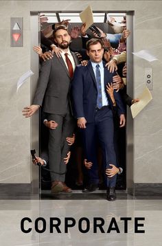 two men in suits and ties are surrounded by papers flying out of an elevator door