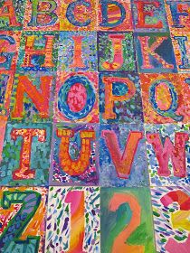 an art project with letters and numbers painted on it