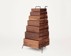 a stack of wooden boxes sitting on top of each other