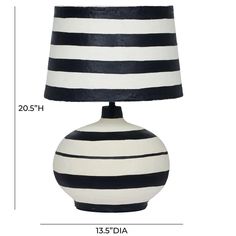 a black and white striped lamp with measurements