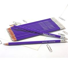 several pencils are lined up next to each other