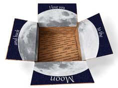 an origami box with the moon and i love you written on it