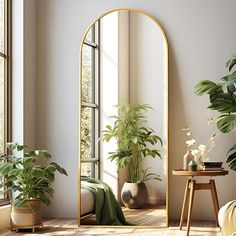 an arch shaped mirror in the corner of a room next to a table with potted plants