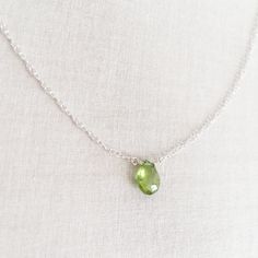 This is a peridot necklace made of genuine high quality faceted peridot. This is a August birthstone necklace. Peridot jewelry is light weight and elegant. This green peridot is around 1 carats. The green stone necklace is great for layering with other gold necklaces. I pay attention to detail and pick the best quality peridot gemstone to make this minimalist necklace. Enjoy free shipping: http://www.sforsparkle.com Measurement: 8 mm by 5 mm S for Sparkle on Etsy https://www.etsy.com/shop/sforsp Green Peridot Necklace For May Birthstone, Peridot Gemstone Necklace For May Birthstone, Peridot Gemstone Beads Necklace As Gift, Peridot Gemstone Beads Necklace For Gift, Peridot Gemstone Bead Necklace For Gift, Lime Green Peridot Necklace For May Birthstone, Peridot Birthstone Necklace For May, Peridot Faceted Jewelry For May Birthstone, Green Peridot Gemstone Necklace