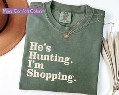 🦌🌿 Unleash your inner hunter-in-style! Introducing our Comfort Colors® Hunting Shirt, perfect for the fierce and fabulous wives and girlfriends who support their hunters. Whether you’re tracking ducks, deer, or tackling the next shopping spree, this shirt is your season essential! Gift your special lady this comfy, eye-catching piece – because every huntress deserves to look her best. Get yours today and tag someone who needs this in their wardrobe! #HuntingSeason #WifeGoals #ComfortColors #EtsyFinds #HunterStyle 💚🦆 Unique Lifestyle, Hunting Season, Duck Hunting, Hunting Shirts, Deer Hunting, Wife Gift, Girlfriend Gift, Shopping Spree, Retail Therapy