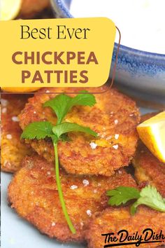 the best ever chickpea patties with lemon wedges and parsley on top