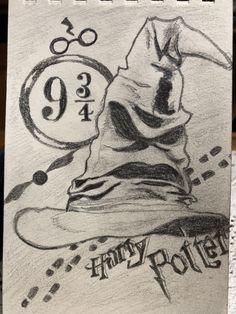 a drawing of a wizard hat with harry potter written on it