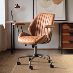 an office chair sitting in front of a desk with a lamp on top of it