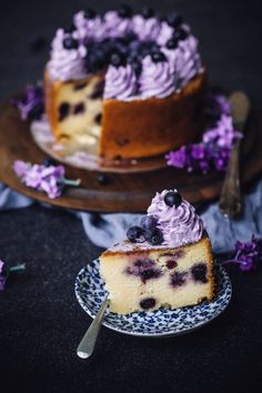 a slice of blueberry cake on a plate