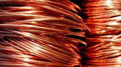 several coils of copper wire stacked on top of each other