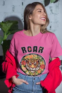 Get ready to release your wild side with our Women's Relaxed Graphic T-Shirt that roars, "Roar like a tiger!" 🐯 This tee is not just a piece of clothing; it's a powerful reminder of the fierce, fabulous person you are! Embrace your inner courage, feel the strength in your bones, and conquer your fears with every step you take. This tee is more than just words; it's an uplifting mantra for every amazing individual out there! We've sprinkled some magic words on this shirt, like "courageous," "str Conquer Your Fears, Every Step You Take, A Tiger, Magic Words, Cropped Tube Top, Tube Top, Piece Of Clothing, Mantra, Womens Clothing Tops