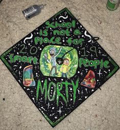 a black and green graduation cap with the words, school is going to be morty